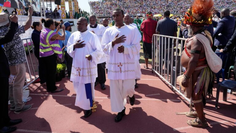 Pope arrives in the remote jungles of Papua New Guinea with a ton of humanitarian aid and toys