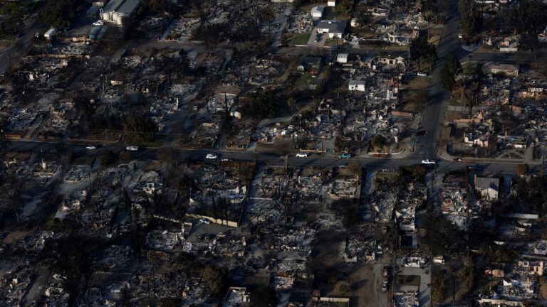 Trump plans visit to LA wildfire zones, pushes to withhold aid