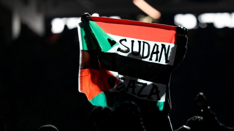 Super Bowl halftime performer detained after unfurling Sudan-Palestine flag